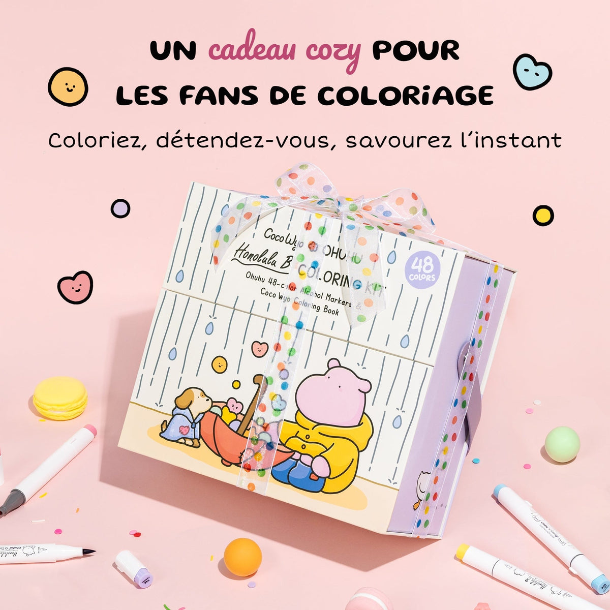 Coffret Ohuhu x Coco Wyo emballé avec un ruban à pois, idée cadeau cozy pour les passionnés de coloriage